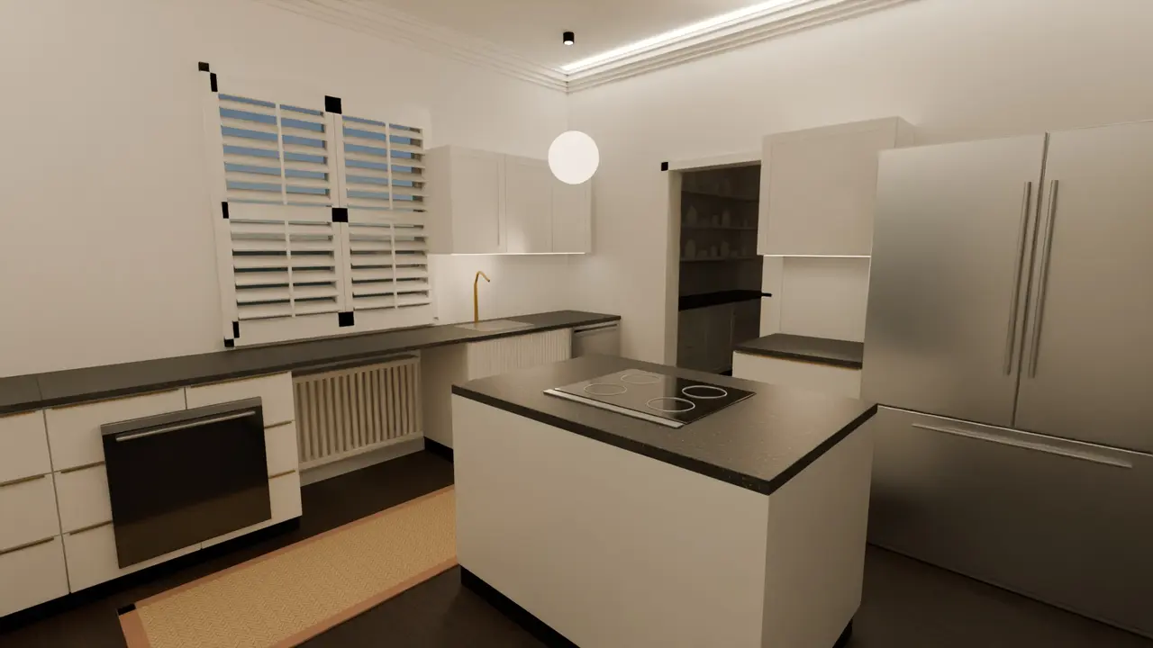 The kitchen at night, lit by its own fixtures